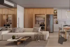 Sala de estar integrada com sofá bege em L, painel de madeira, lavanderia embutida e cozinha ao fundo — In Haus Afonso Pena em Canto, Florianópolis