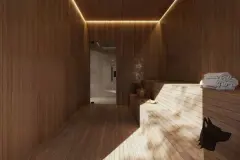 Sauna seca totalmente revestida de madeira clara com prateleiras, toalhas e visão para área úmida ao fundo — Infinite Campeche em Campeche, Florianópolis