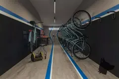 Hall de entrada com duas poltronas redondas brancas, mesinha lateral com planta e parede de painéis iluminados — Infinite Campeche em Campeche, Florianópolis