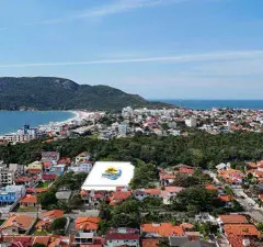 Vista aérea do bairro Ingleses com marcador de localização azul indicando o terreno do empreendimento — Infinity Residence em Ingleses, Florianópolis