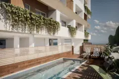 Perspectiva frontal do edifício, ângulo levemente inclinado com carros e entrada principal iluminada — Infinity Residence em Ingleses, Florianópolis
