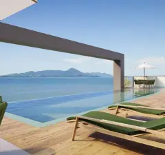 Piscina infinita no rooftop com espreguiçadeiras verdes, deck de madeira e vista para a Baía Norte — Jardim de Coqueiros em Coqueiros, Florianópolis