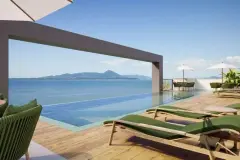 Piscina infinita no rooftop com espreguiçadeiras, pérgola e vista para as ilhas da Baía Norte — Jardim de Coqueiros em Coqueiros, Florianópolis