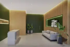 Hall de entrada com recepção, painel ripado em madeira, logotipo Jardim Coqueiros e sofá cinza — Jardim de Coqueiros em Coqueiros, Florianópolis