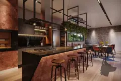 Perspectiva da cozinha-gourmet do Liv 2460 com bancada de granito rosé, banquetas e jardim suspenso — LIV 2460 Boutique Residence em João Paulo, Florianópolis