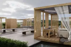 Perspectiva dos quiosques de spa ao ar livre do Maldivas Spa Urbano com mesas de massagem e jardim — Maldivas SPA Urbano em Ingleses, Florianópolis
