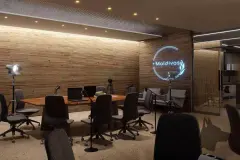 Perspectiva do estúdio de podcast do Maldivas Spa Urbano com mesa oval e equipamentos audiovisuais — Maldivas SPA Urbano em Ingleses, Florianópolis