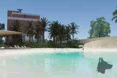 Perspectiva da piscina tipo praia do Maldivas Spa Urbano com área sombreada e coqueiros — ângulo alternativo — Maldivas SPA Urbano em Ingleses, Florianópolis