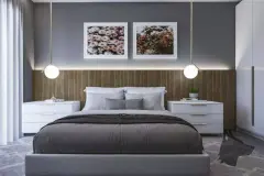 Suíte decorada com cama de casal, cabeceira em painel de madeira, pendentes esféricos e quadros florais — Manhattan Residence em Ingleses, Florianópolis