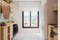 Lavanderia com bancada amadeirada, prateleiras e área de serviço com janela — Mar do Norte Studios em Ingleses, Florianópolis