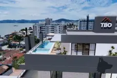 Vista aérea do rooftop com piscina e logotipo TBO Construtora, Baía Norte e Florianópolis ao fundo — Maranello Residence em Balneário, Florianópolis