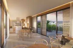 Sala de jantar e estar da cobertura com mesa de madeira, cadeiras Wishbone e varanda ao entardecer — Marena em Canasvieiras, Florianópolis