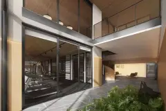 Área comum com academia visível pelo vidro, hall com logo Marena e jardim interno — Marena em Canasvieiras, Florianópolis