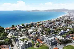 Vista aérea panorâmica de Canasvieiras com praia de mar azul e montanhas ao fundo — Marena em Canasvieiras, Florianópolis