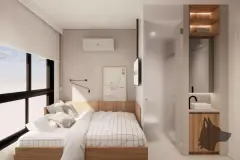Studio com cama de casal, nicho iluminado e banheiro integrado com lavabo, ângulo variante — Max Studios 45 em João Paulo, Florianópolis