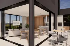 Sala de estar da cobertura com sofá, mesa de jantar, cozinha com ilha e logotipo MaxStudios — Max Studios 45 em João Paulo, Florianópolis