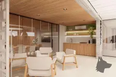 Coworking com mesa redonda branca, cadeiras, notebooks e árvore interna natural — Max Studios 45 em João Paulo, Florianópolis