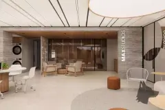 Fachada noturna do edifício com 8 andares iluminado e logotipo MaxStudios na entrada — Max Studios 45 em João Paulo, Florianópolis