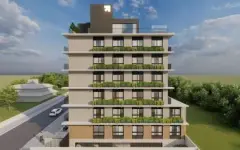 Fachada lateral oblíqua com 8 andares, palmeira, varandas verdes e entrada principal — Max Studios 45 em João Paulo, Florianópolis