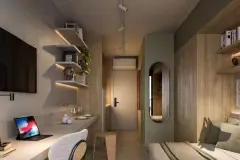 Studio com mesa de trabalho integrada, prateleiras iluminadas, espelho oval e closet de madeira — Max Studios 177 em Pantanal, Florianópolis