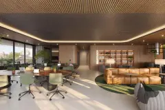 Coworking com mesas redondas de madeira, cadeiras verdes, lounge com sofá de couro e estante — Max Studios 177 em Pantanal, Florianópolis