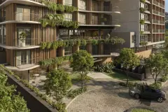 Fachada lateral diurna ângulo alternativo com varandas curvas e vegetação exuberante — Max Studios 177 em Pantanal, Florianópolis