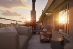 Varanda privativa ao pôr do sol com sofás modulares, mesa lateral de madeira e lareira ao fundo — Maxxi Garden em Cachoeira do Bom Jesus, Florianópolis