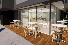 Terraço externo do café Veleiro com mesas altas, tamboretes e calçada — Maxxi View em Jurerê, Florianópolis