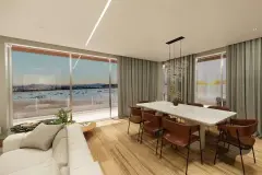 Sala de jantar com mesa branca e cadeiras caramelo, janela panorâmica com vista para o mar e montanhas — Maxxi View em Jurerê, Florianópolis