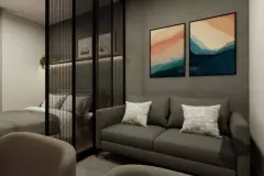 Sala com sofá cinza e quadros abstratos, ângulo alternativo com quarto ao fundo — Maxxi View em Jurerê, Florianópolis