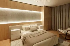 Closet aberto de madeira com bolsas e sapatos, cama e janela com vista para o mar ao fundo — Maxxi View em Jurerê, Florianópolis