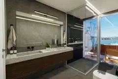 Suíte master com closet de madeira, cama de casal, mesa de trabalho e janela com vista para o mar — Maxxi View em Jurerê, Florianópolis