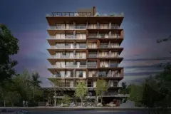 Fachada noturna completa com 10 andares em corten, varandas iluminadas e letreiro Café Jurerê e Meraki Allure — Meraki Allure em Jurerê, Florianópolis