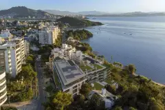 Vista aérea do empreendimento Meraki Sunset em João Paulo, Florianópolis, com mar e morros ao fundo — Meraki Sunset em João Paulo, Florianópolis