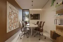 Sala de reuniões com mesa redonda, cadeiras executivas marrons, TV e quadro artístico — Meraki Sunset em João Paulo, Florianópolis