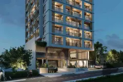Fachada frontal oblíqua noturna do edifício Mira Apartments com múltiplos andares e entrada iluminada — Mirá Apartments em Centro, Florianópolis