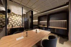 Coworking com mesa comprida, cadeiras, pods de trabalho individuais e letreiros neon com decoração contemporânea — Mirá Apartments em Centro, Florianópolis