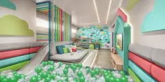 Brinquedoteca com piscina de bolinhas, escorregador, sofá e decoração colorida — Miragio en Cacupé, Florianópolis