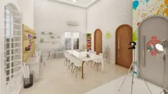 Espaço kids de artes com mesa grande, materiais artísticos, mural colorido e cavaletes — Mirante dos Corais em Coqueiros, Florianópolis