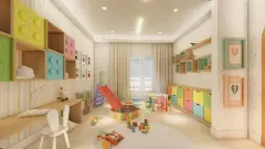 Brinquedoteca colorida com escorregador, piscina de bolinhas, prateleiras LEGO e mesa de atividades — Mirante dos Corais em Coqueiros, Florianópolis