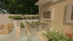 Horta comunitária com canteiros elevados de concreto e vegetação — Mirante dos Corais em Coqueiros, Florianópolis