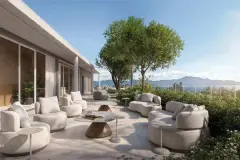terraço rooftop poltronas brancas arredondadas mesas laterais árvore vista mar morros — Natus em Ponta das Canas, Florianópolis