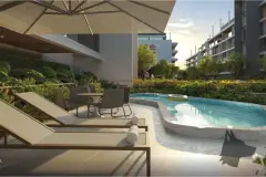 piscina deck espreguiçadeiras mesa cadeiras jacuzzi jardim fachada blocos entardecer — Natus em Ponta das Canas, Florianópolis