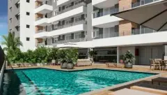 piscina fachada Neo Continente deck guarda-sol vegetação tropical — Neo Continente em Estreito, Florianópolis