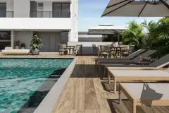 piscina deck espreguiçadeiras guarda-sol mesas jantar fachada lateral — Neo Continente em Estreito, Florianópolis