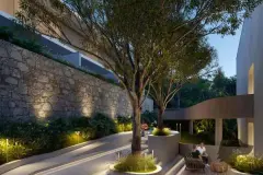 jardim comum noturno árvore iluminada muro pedra pessoas sentados parede ripas madeira — Oazys em Santo Antônio de Lisboa, Florianópolis