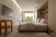 suíte cama casal TV cadeiras laranjas escrivaninha prateleiras janela vista jardim — Oazys em Santo Antônio de Lisboa, Florianópolis