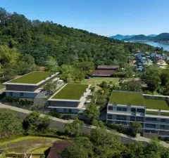 vista aérea frontal implantação blocos telhado verde bairro mar ilhas colinas — Oazys em Santo Antônio de Lisboa, Florianópolis