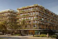 fachada render ângulo frontal 2 blocos ripas madeira varandas vegetação lojas térreo calçada pedestres carros — Óppera Smart Life em Campeche, Florianópolis