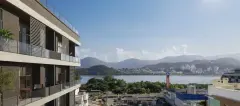 fachada render lateral varandas vidro venezianas brancas bairro Agronômica lagoa montanhas fundo supermercado Angeloni — Opus em Agronômica, Florianópolis